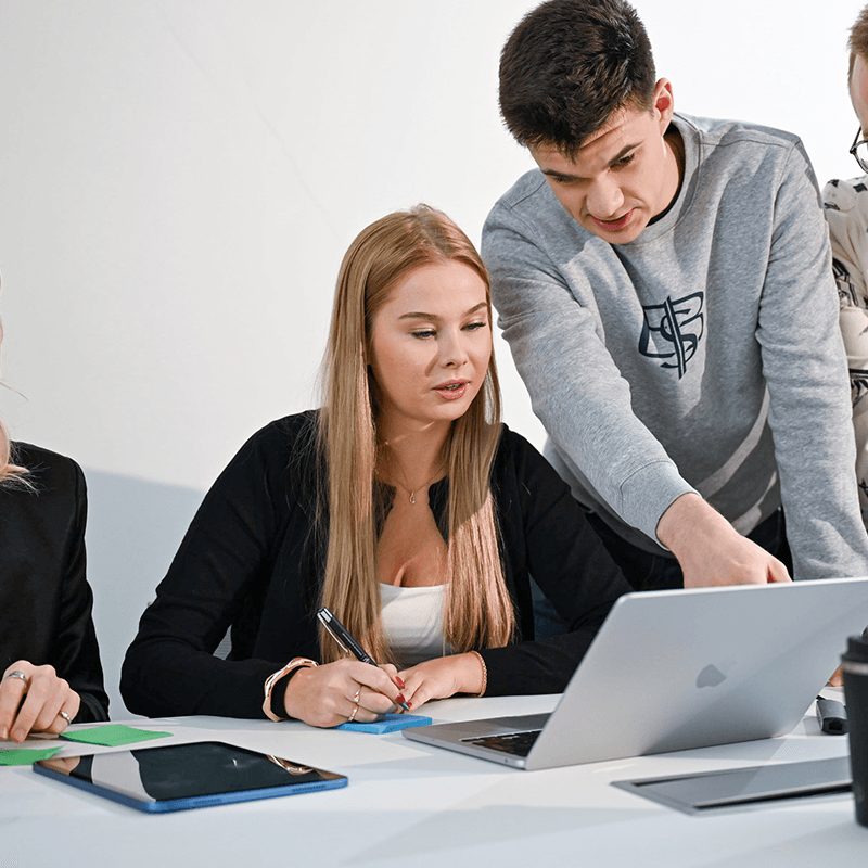 EBS Bachelor's students on computer