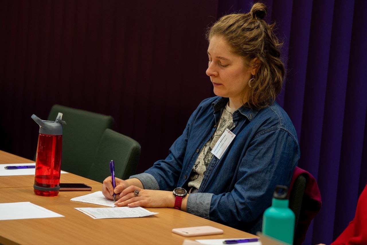 Aleksandra at a conference