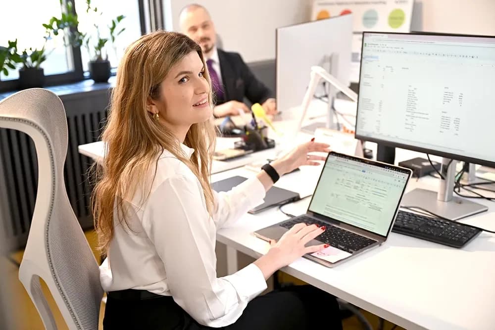 masters student on computer MBA