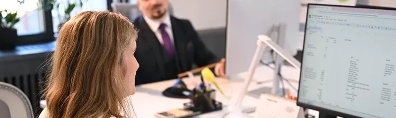 Woman working on computer in office