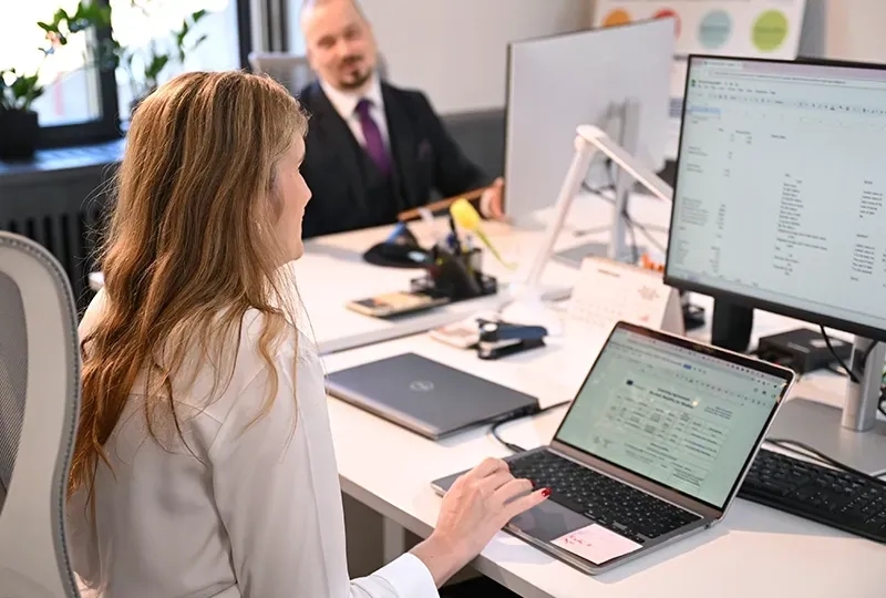 Woman working on computer in office
