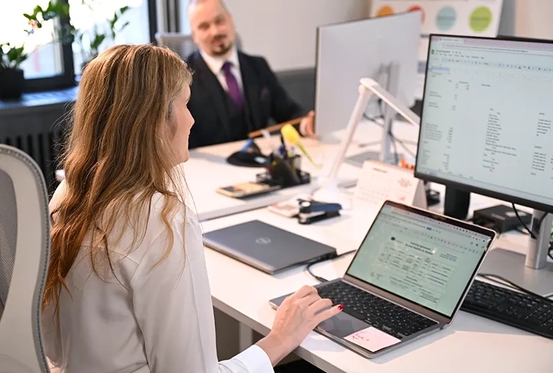 Woman working on computer in office